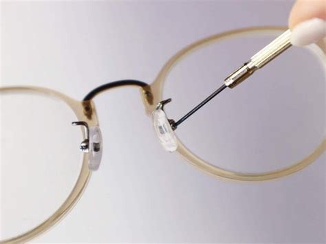 fix nose pad on glasses.